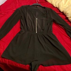 Black long sleeve zip up romper by Express M